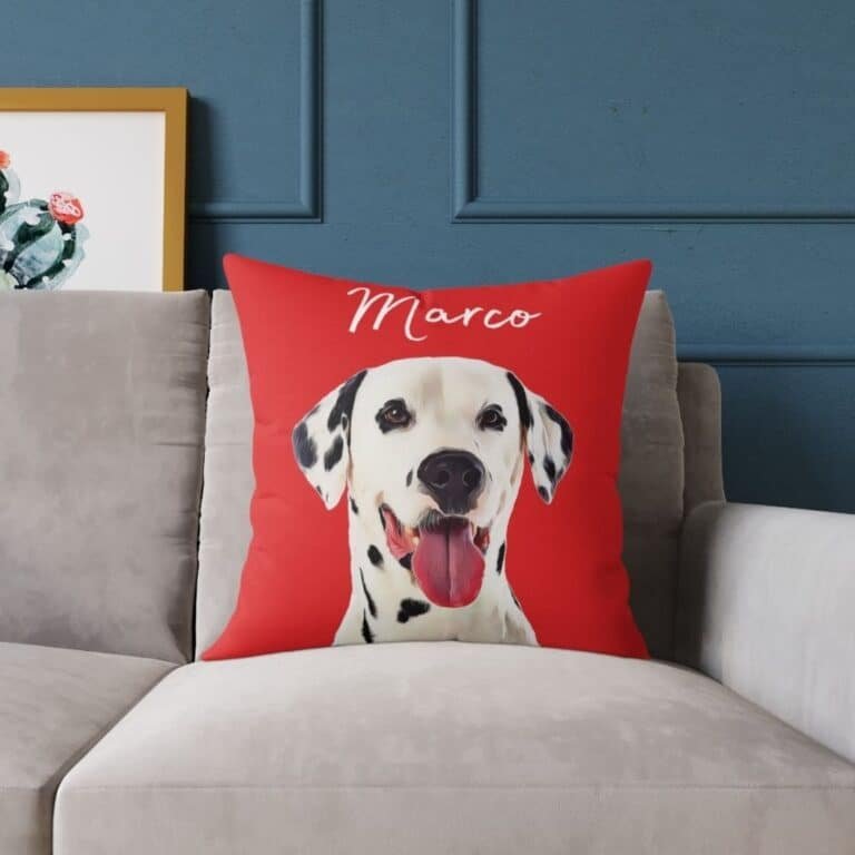 Custom dog portrait pillow, red, placed on a couch