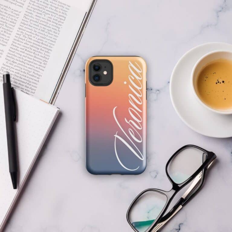 tough phone case with name – Style 4, placed on a work desk. Features a durable, personalized design with custom lettering and reinforced protection for enhanced durability.