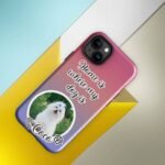 Personalized dog phone case featuring a custom dog photo and name with the phrase "Home Is Where My Dog Is," Style 3, displayed in a lifestyle setting