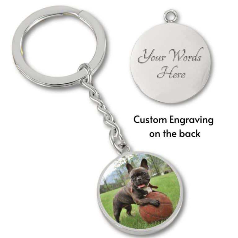 Personalized dog photo keychain in surgical steel, featuring a custom dog photo and engraved text. A durable and heartfelt accessory for dog owners, offering a lasting reminder of a beloved pet.