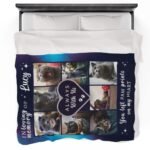 Navy pet memorial blanket featuring an 8-photo collage, elegantly laid on a bed