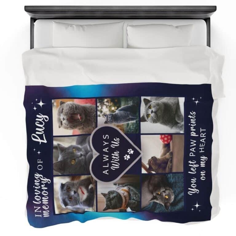 Navy pet memorial blanket featuring an 8-photo collage, elegantly laid on a bed