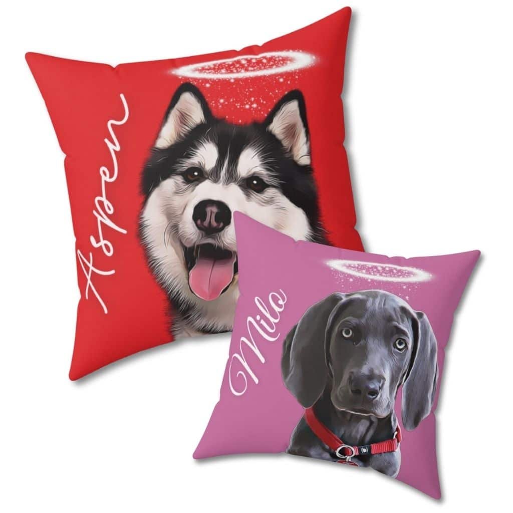Two red and light pink custom pet remembrance pillows with pet portrait and halo ring, close-up view