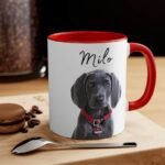 with red color inside custom dog portrait mug, placed on a table