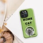 Personalized pet portrait phone case for iPhone featuring a custom cat photo and name in Conifer color