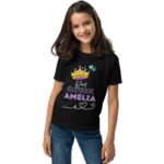 Black birthday girl shirt with crown shown from the front, featuring a gold crown graphic above a personalized name in stylish lettering